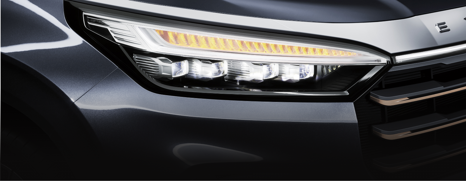 The all-LED headlights on the VX SUV are complemented by cornering lights and dynamic turn signals. The daytime running lights below also feature LED technology.